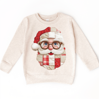 Faux Santa Patchwork Christmas design on a natural sweatshirt.