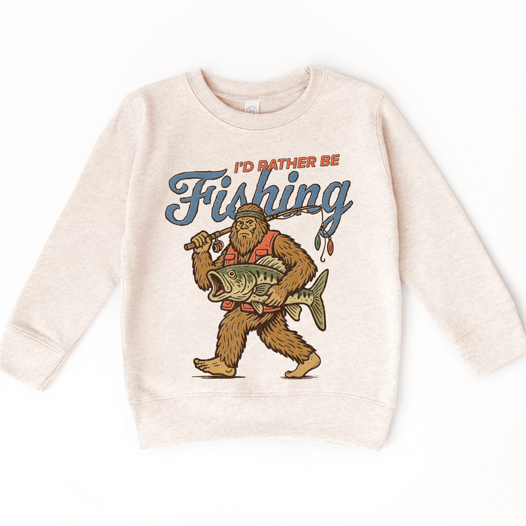 Kids “I’d Rather Be Fishing” Graphic Tee – Bigfoot Fishing Shirt