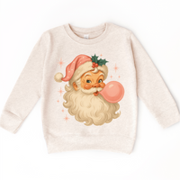 Vintage Santa Clause Blowing A Bubble Christmas on natural kids sweatshirt