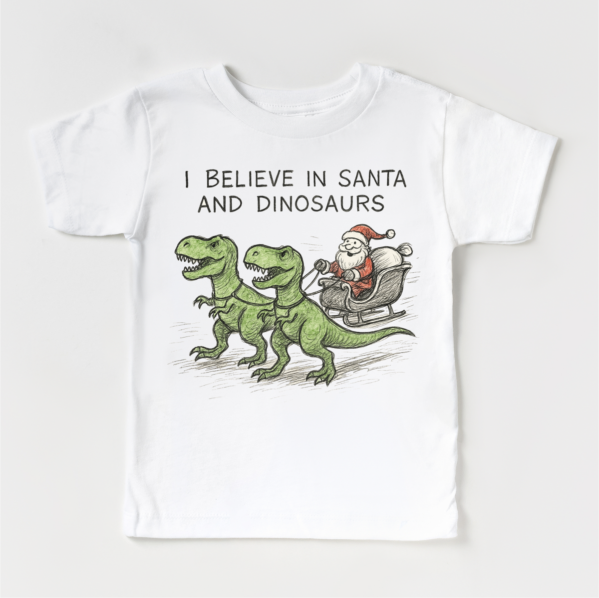 I Believe In Santa And Dinosaurs Christmas design on a white garment.