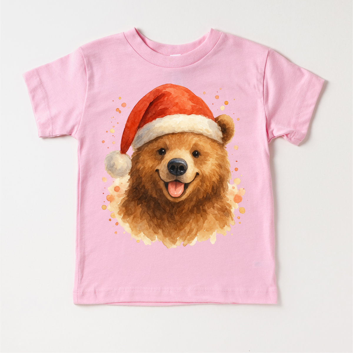 Christmas Honey Bear Santa design on a pink garment.