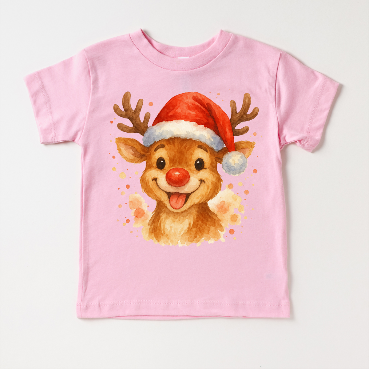 Christmas Rudolph The Reindeer Santa design on a pink garment.