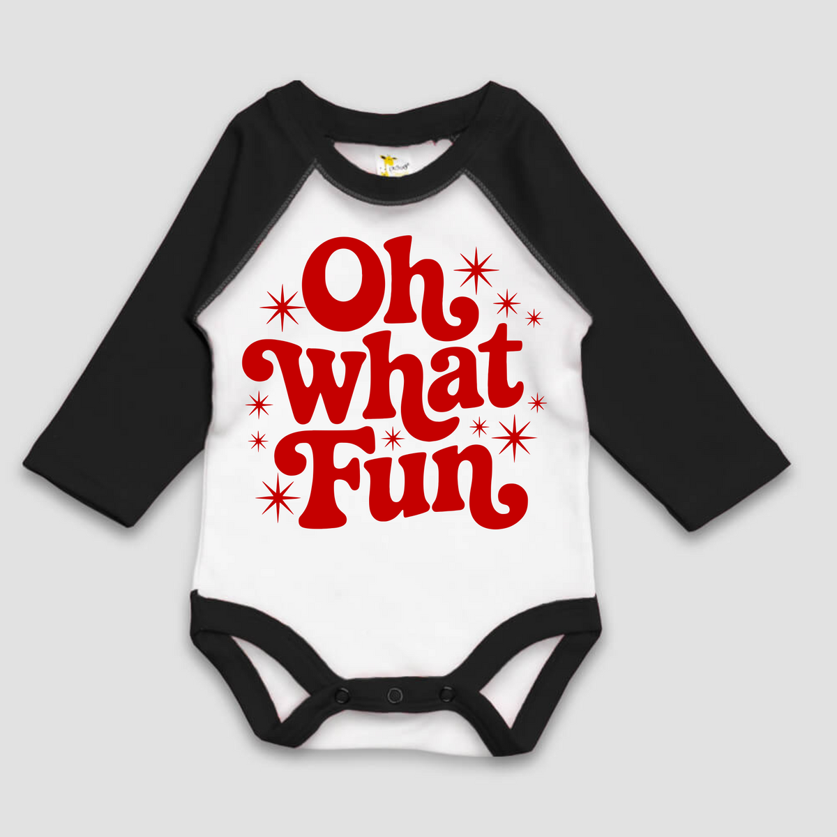 Oh What Fun Christmas Long Sleeve Onesie design on a black-accented shirt.