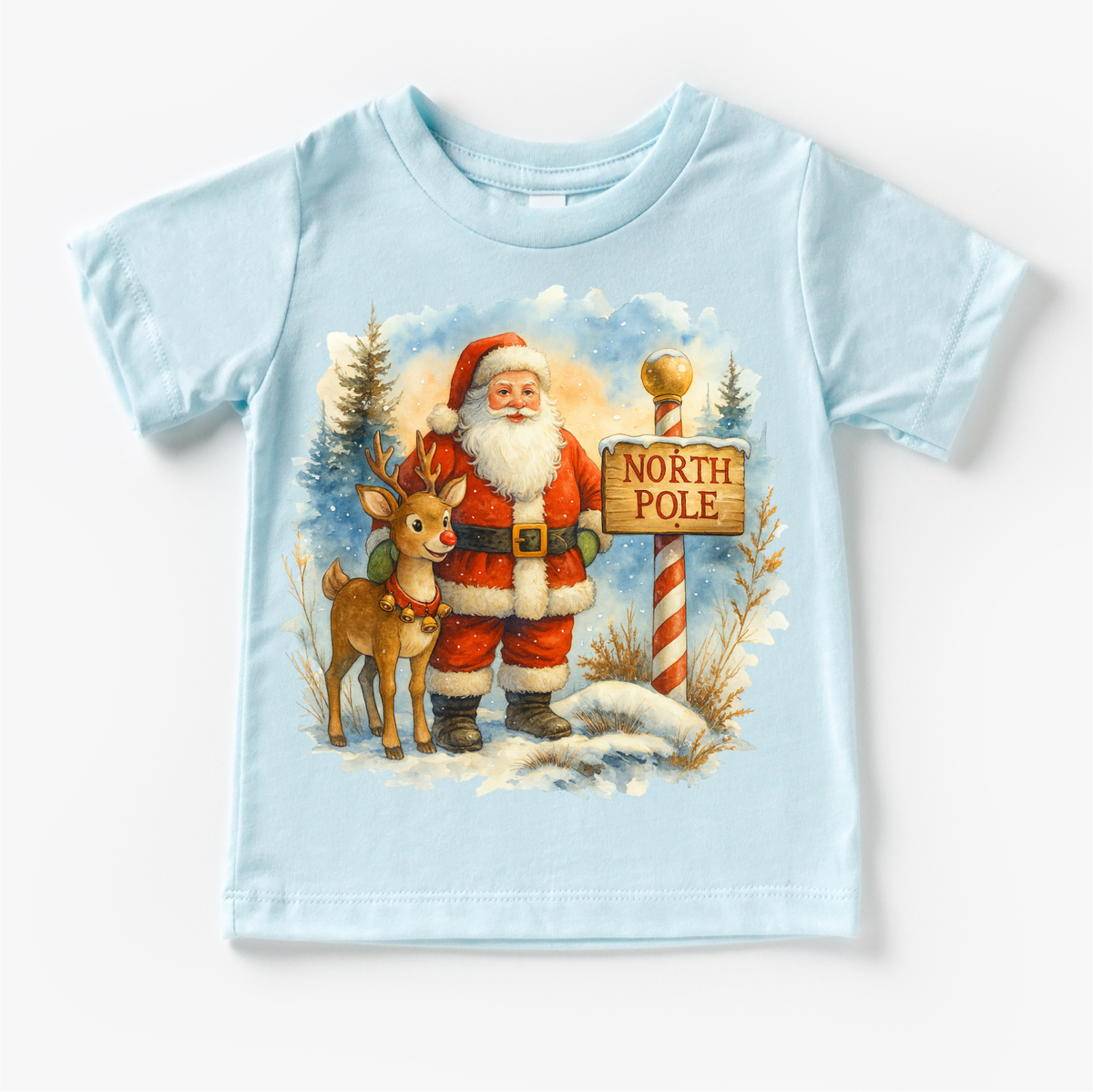 Santa and Rudolph North Pole Christmas design on a blue garment.