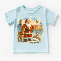 Santa and Rudolph North Pole Christmas design on a blue garment.