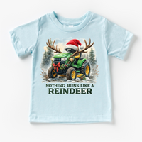 Nothing Runs Like A Reindeer Christmas Tractor design on a blue garment.