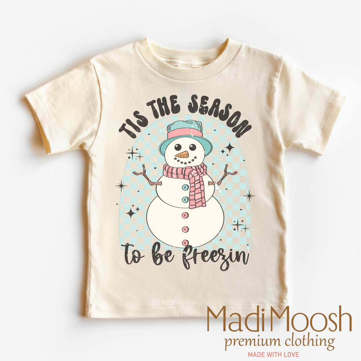 Tis The Season To Be Freezing Christmas design on a natural garment.