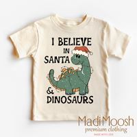 I Believe In Santa And Dinosaurs Christmas graphic T-shirt by Madi Moosh