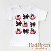 Cute Halloween Pumpkins And Bows design on a white garment.