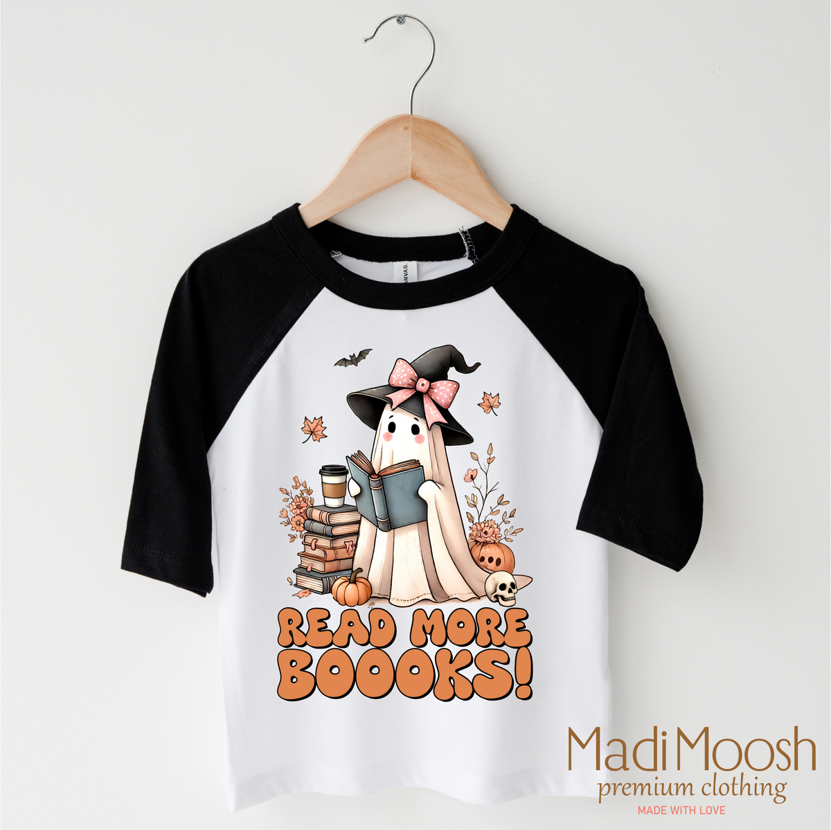 Read More Boooks design on a black-accented shirt.