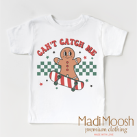 Can't Catch Me Gingerbread Man Christmas design on a white garment.