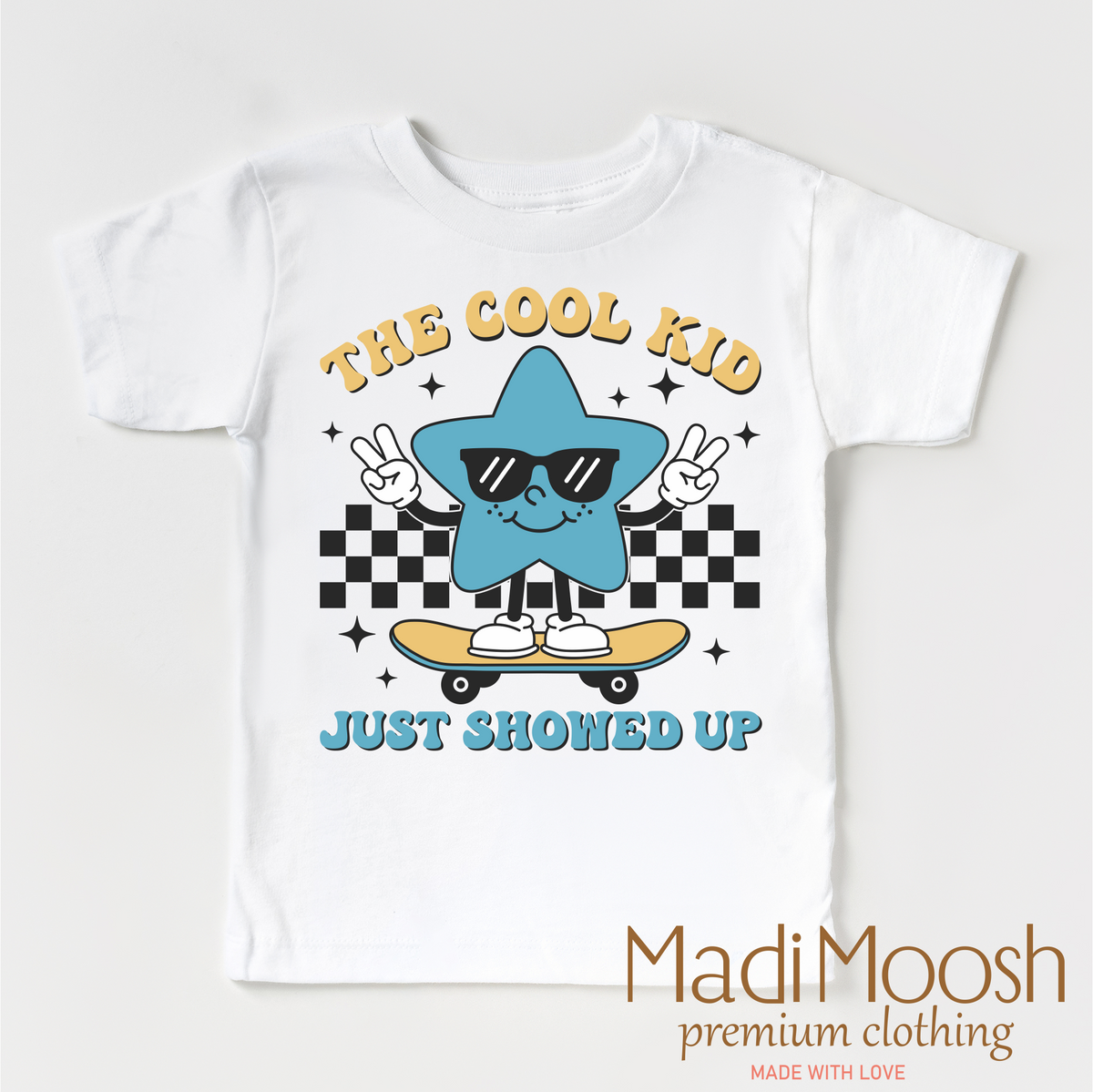 The Cool Kid Just Showed Up Back To School design on a white garment.