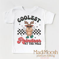 Coolest Reindeer At The Pole Christmas design on a white garment.