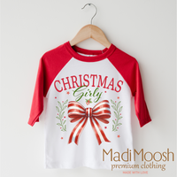 Christmas Girly Bow design on a red-accented shirt.