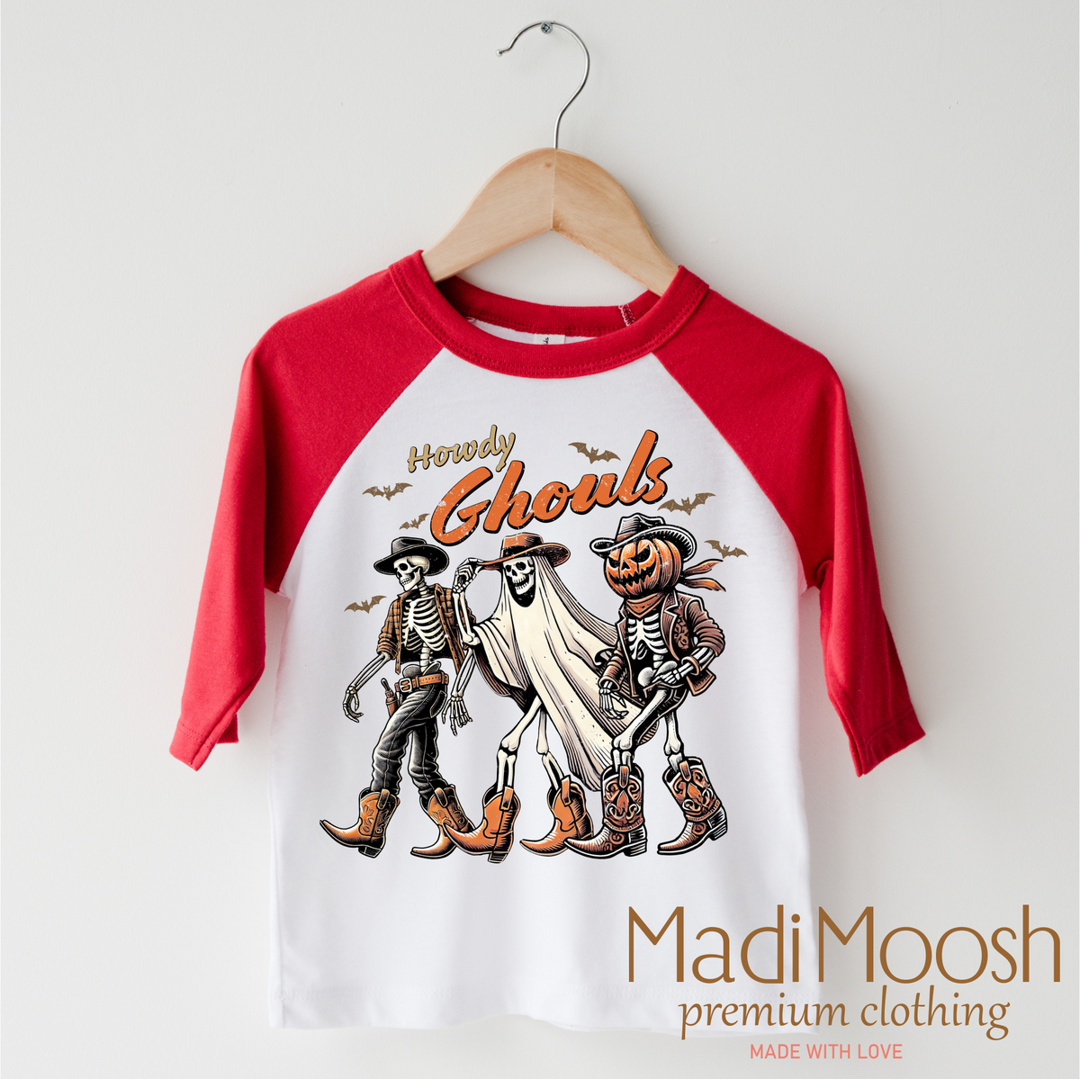 Howdy Ghouls Western design on a red-accented shirt.
