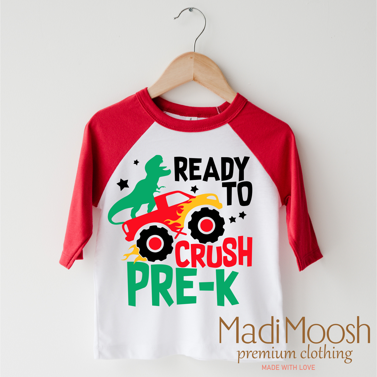 I'm Ready To Crush Pre-K Dinosaur Monster Truck design on a red-accented shirt.