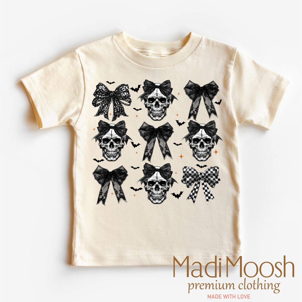 Skulls And Bows Halloween design on a natural garment.