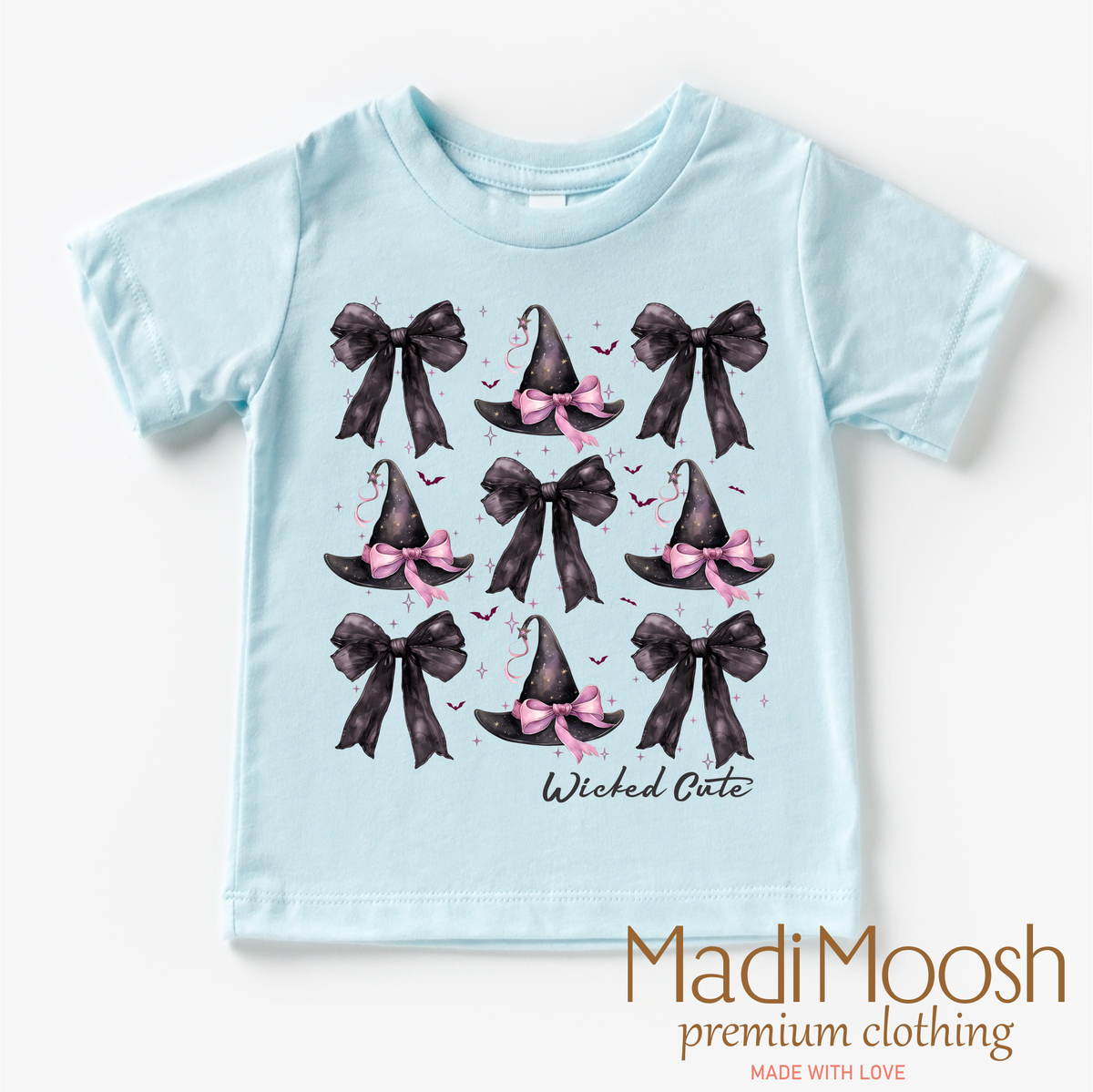 Witch Hats And Bows Halloween design on a blue garment.