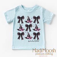 Witch Hats And Bows Halloween design on a blue garment.