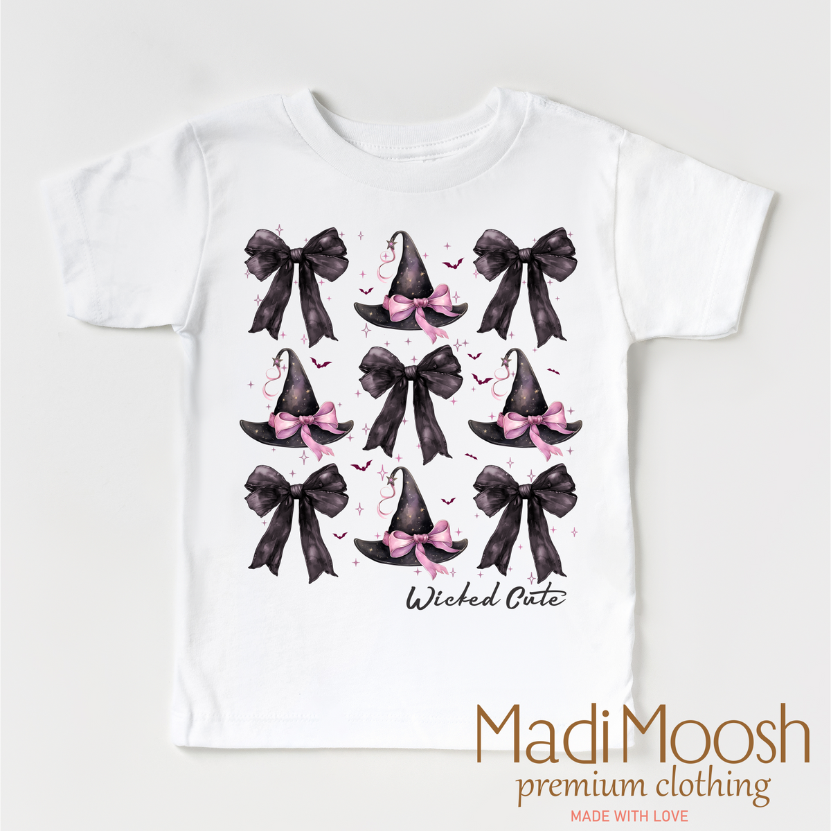 Witch Hats And Bows Halloween design on a white garment.