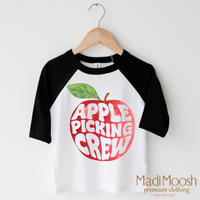 Apple Picking Crew design on a black-accented shirt.