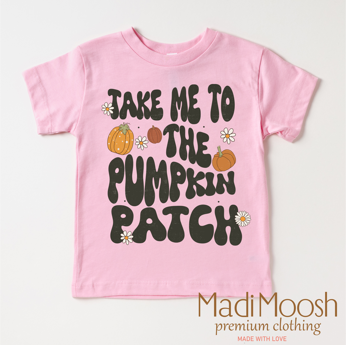 Take Me To The Pumpkin Patch design on a pink garment.