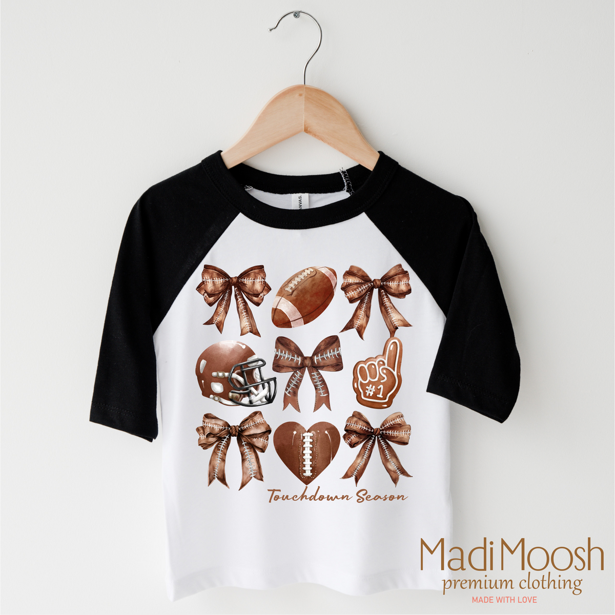 Football And Bows Girls design on a blue garment.