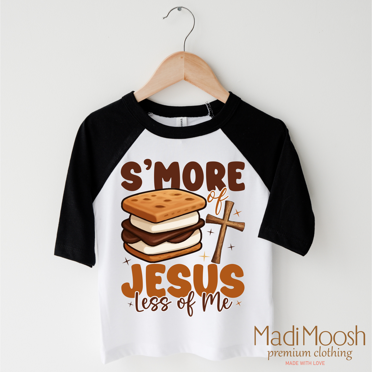 S'more Of Jesus Less Of Me design on a black-accented shirt.