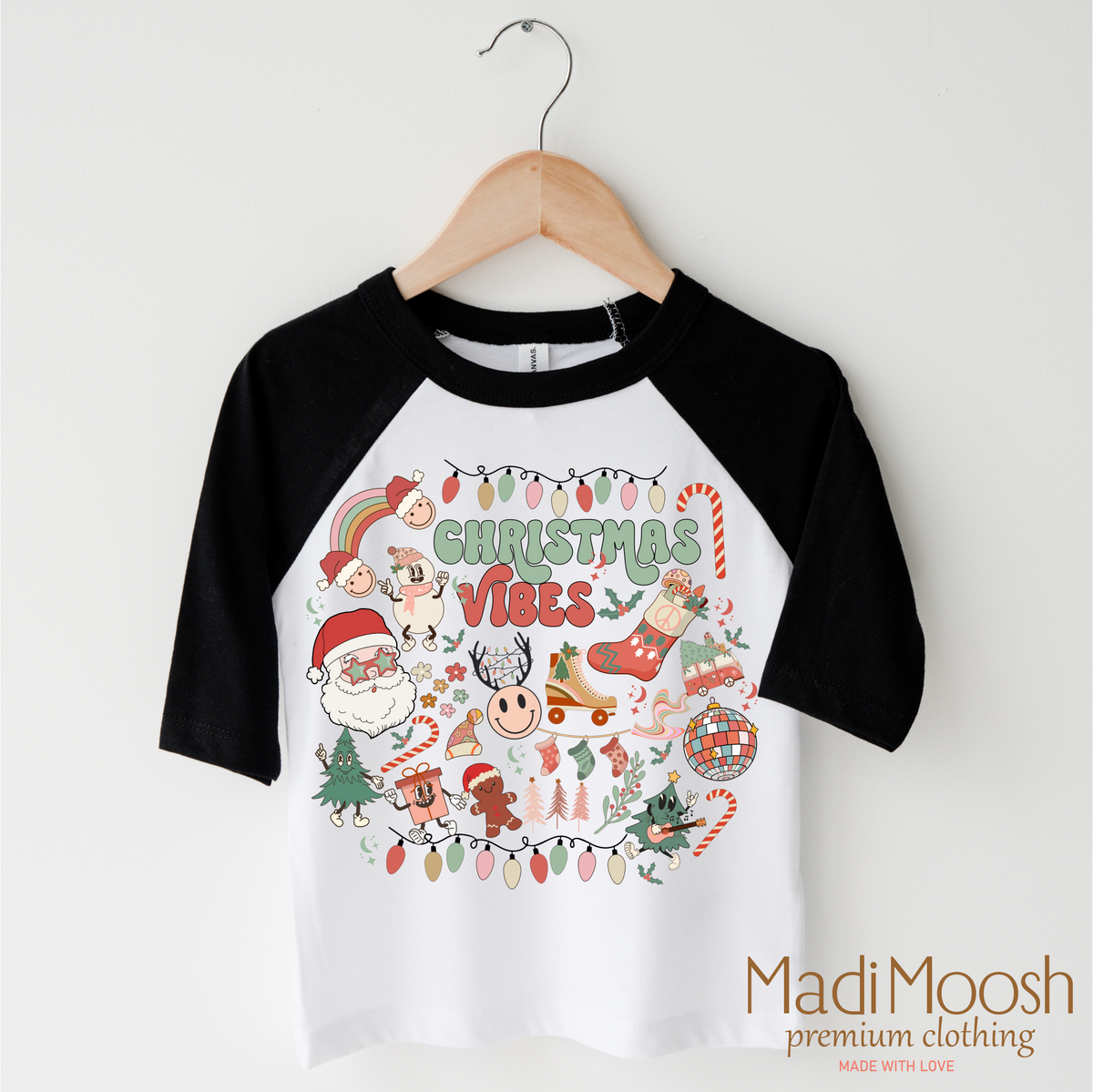 Christmas Vibes design on a black-accented shirt.