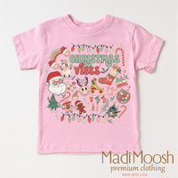 Christmas Vibes design on a pink garment.