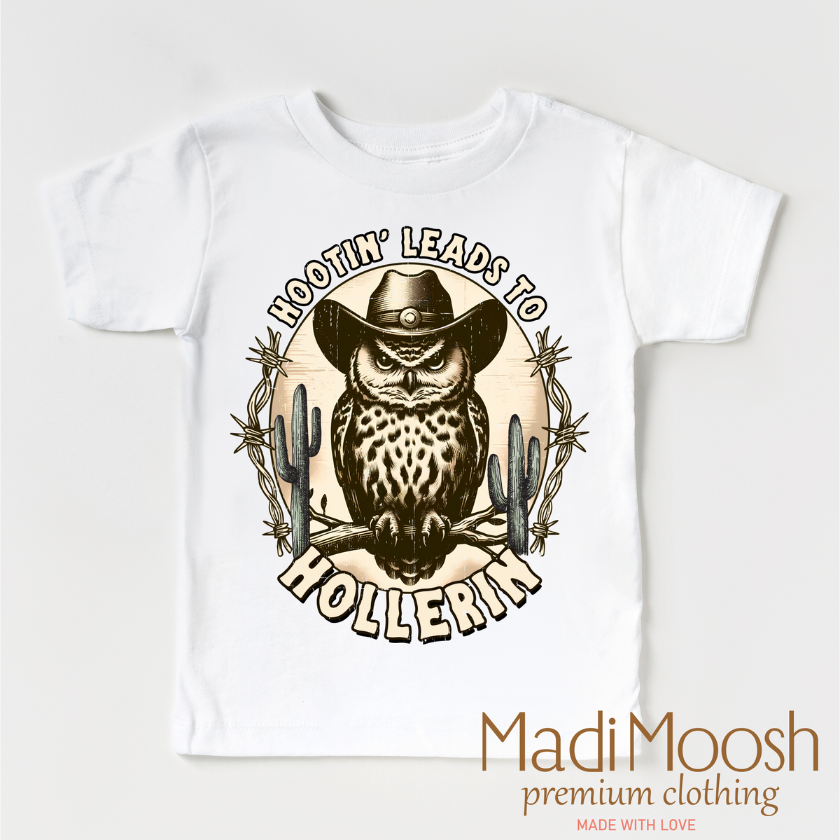 Hootin Leads To Hollerin Western design on a white garment.