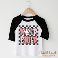 Wild Child Halloween design on a black-accented shirt.