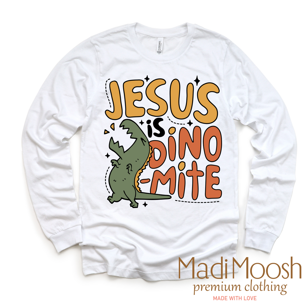 Jesus Is Dinomite Christian design on a long sleeve shirt.