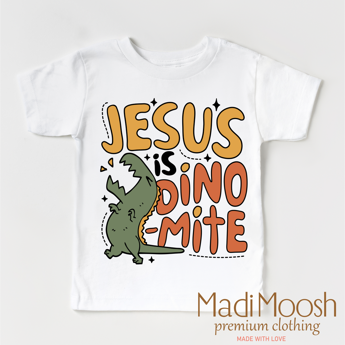Jesus Is Dinomite Christian design on a white garment.