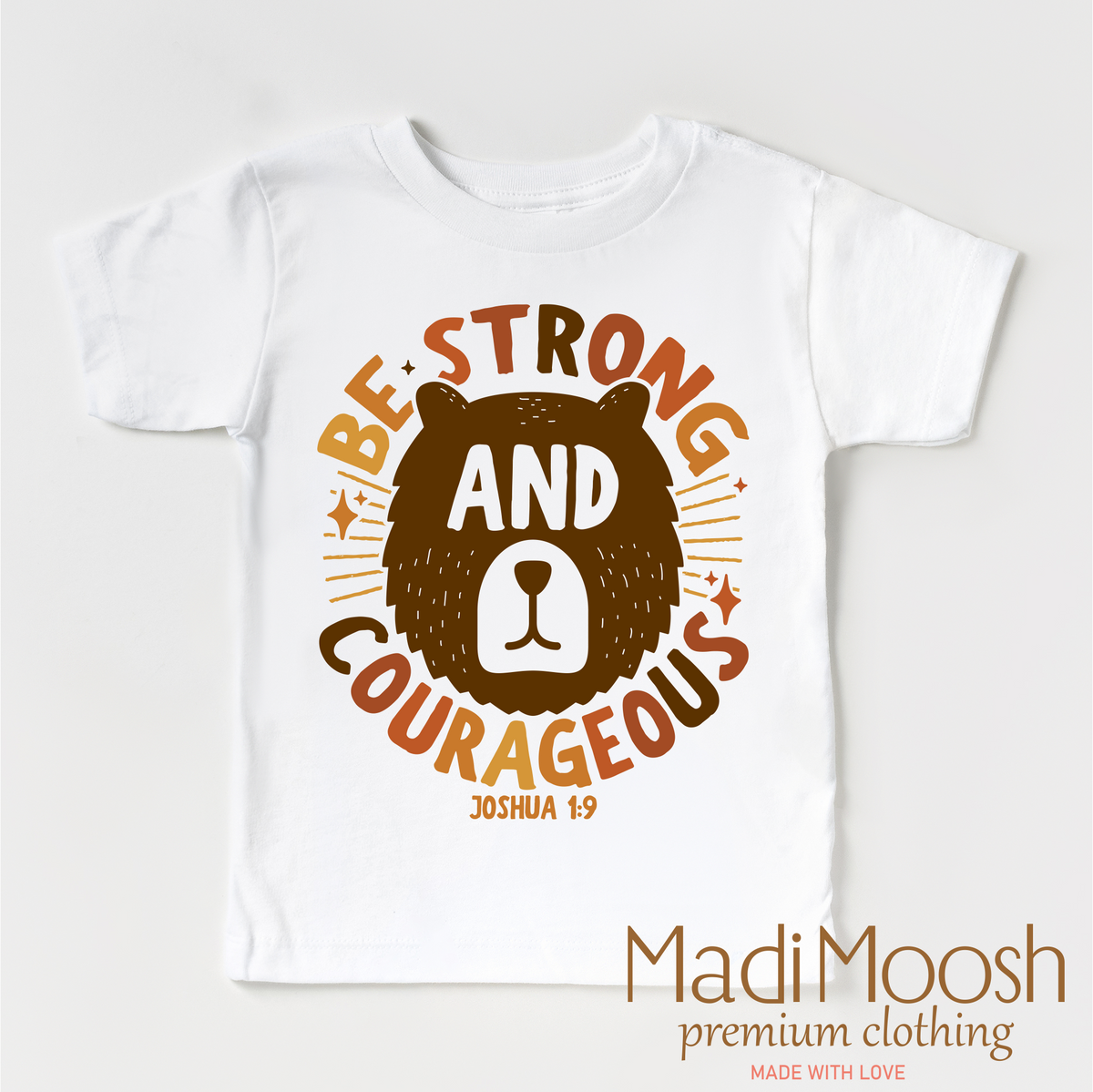 Be Strong And Courageous Joshua 1:9 design on a white garment.