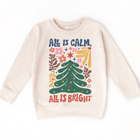 Boho All Is Calm All Is Bright Christmas design on a natural sweatshirt.