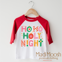 Ho Ho Holy Night Christmas design on a red-accented shirt.