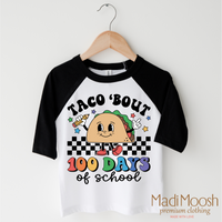 Taco Bout 100 Days Of School design on a black-accented shirt.