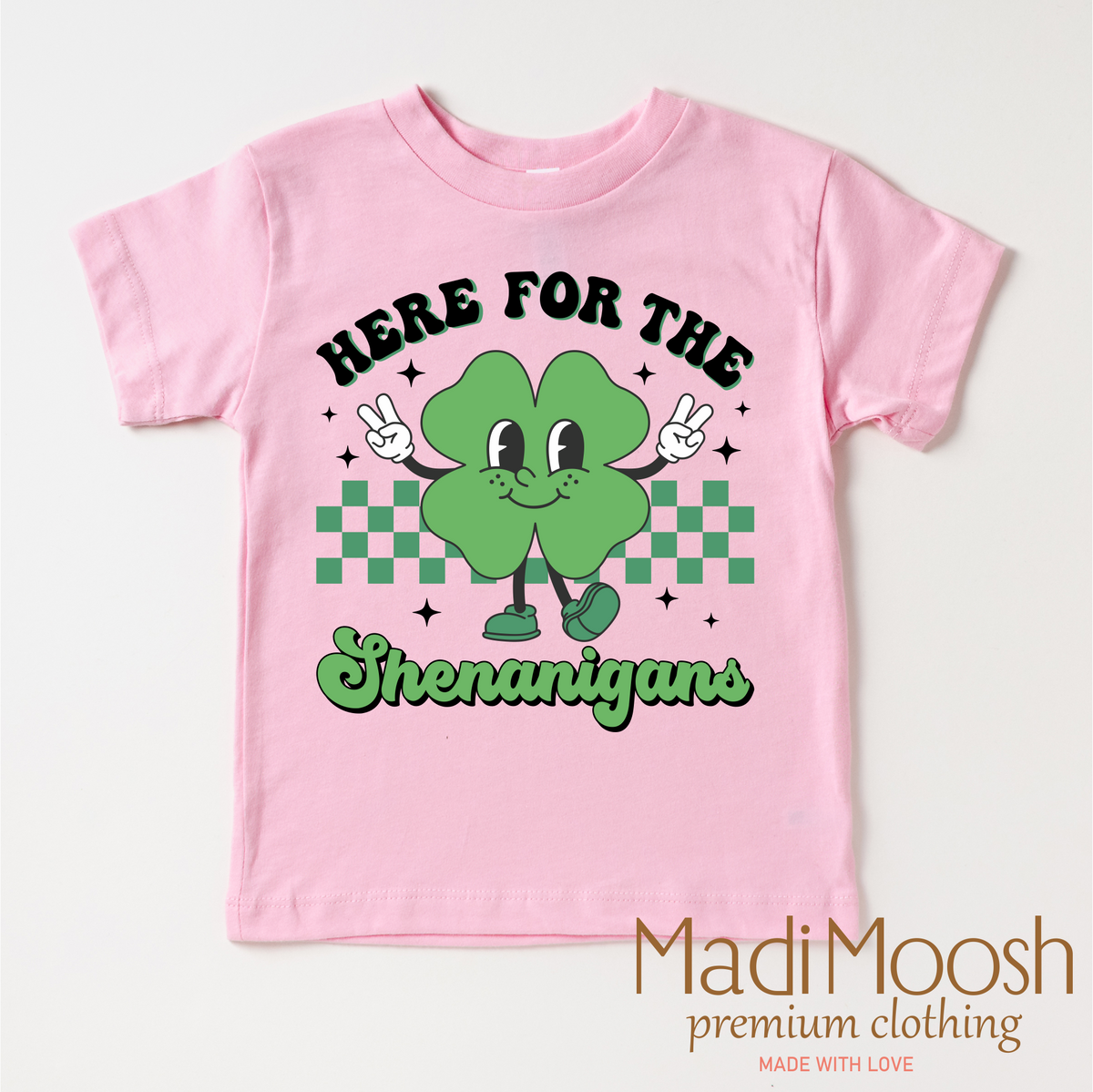 Here For The Shenanigan's St. Patrick's Day design on a pink garment.