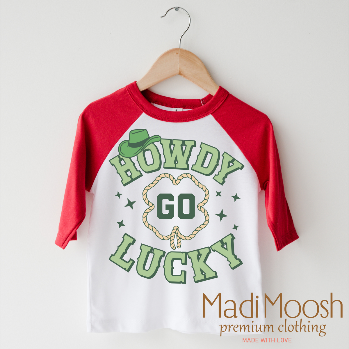 Howdy Go Lucky Western St. Patrick's Day design on a red-accented shirt.