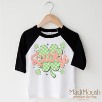 St. Patrick's Day Lucky Clover design on a black-accented shirt.