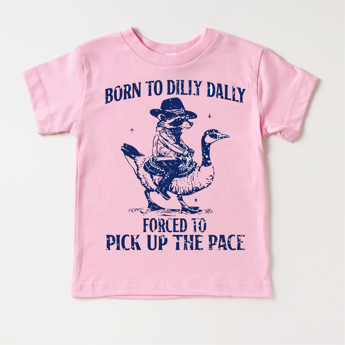 Born To Dilly Dally Forced To Pick Up The Pace design on a pink garment.