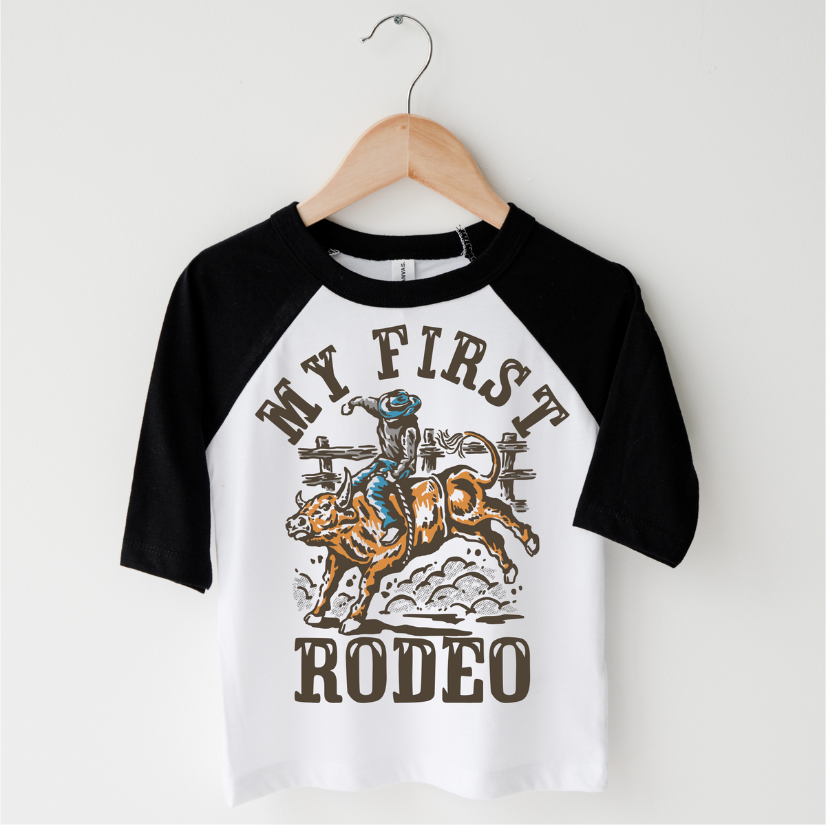 My First Rodeo Birthday design on a black-accented shirt.