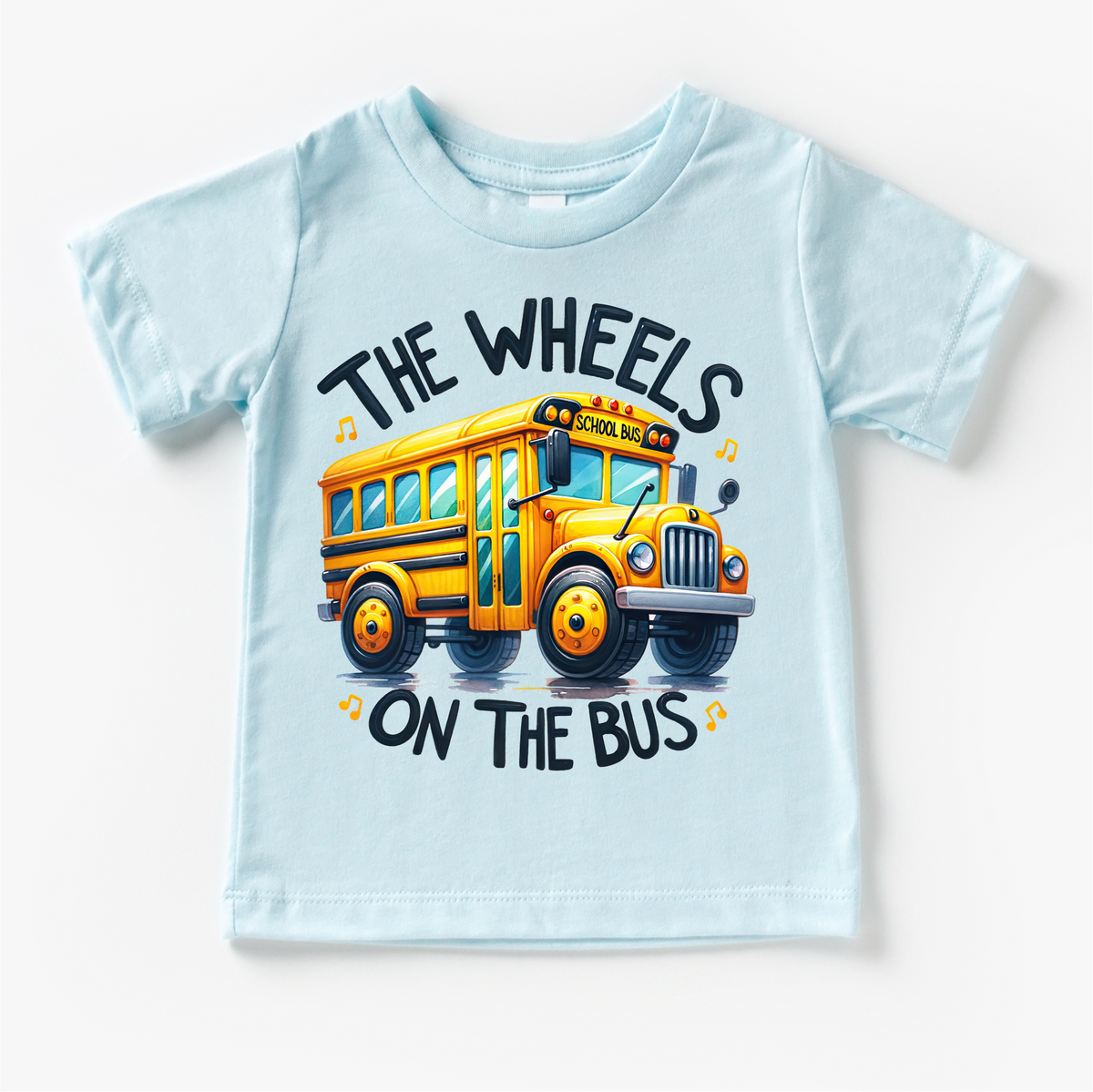 The Wheels On The Bus School design on a blue garment.