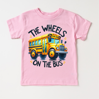 The Wheels On The Bus School design on a pink garment.