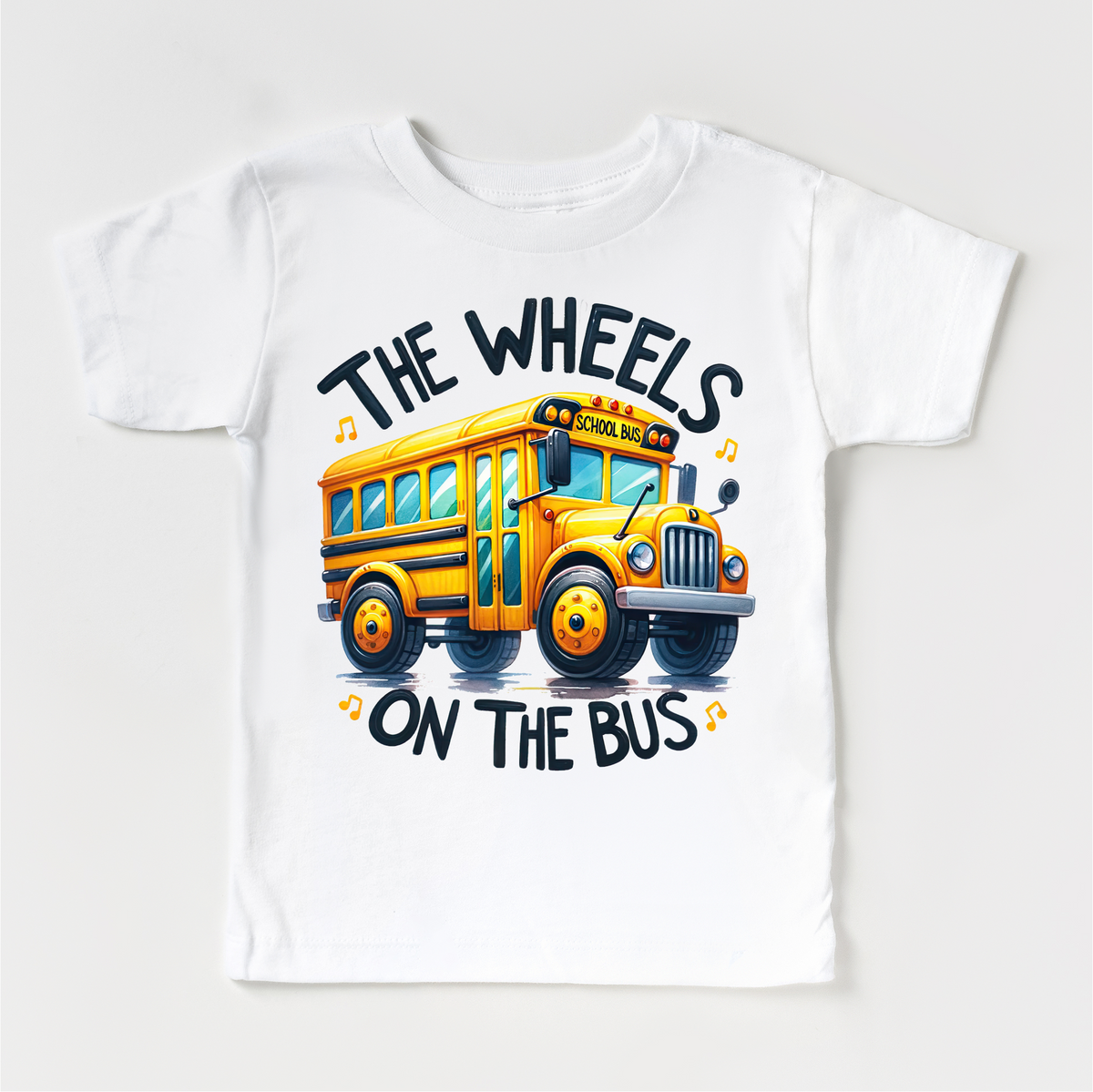 The Wheels On The Bus School design on a white garment.