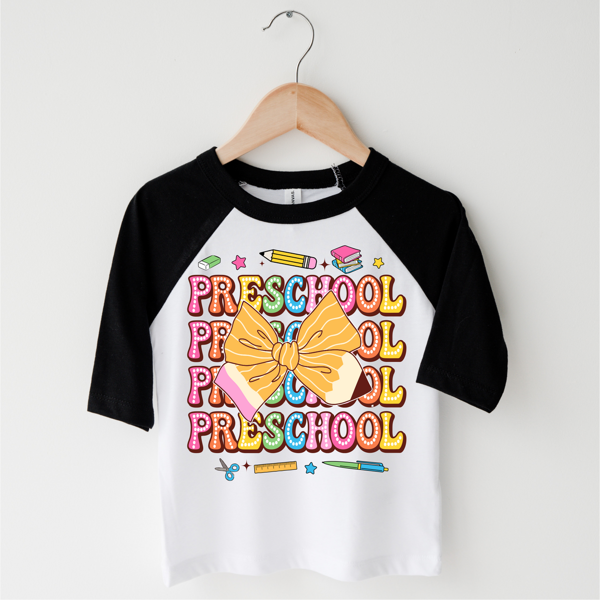 Preschool School design on a black-accented shirt.