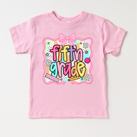 Girls 5th grade School design on a pink garment.