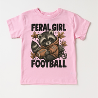 Feral Girl Football Raccoon design on a pink garment.