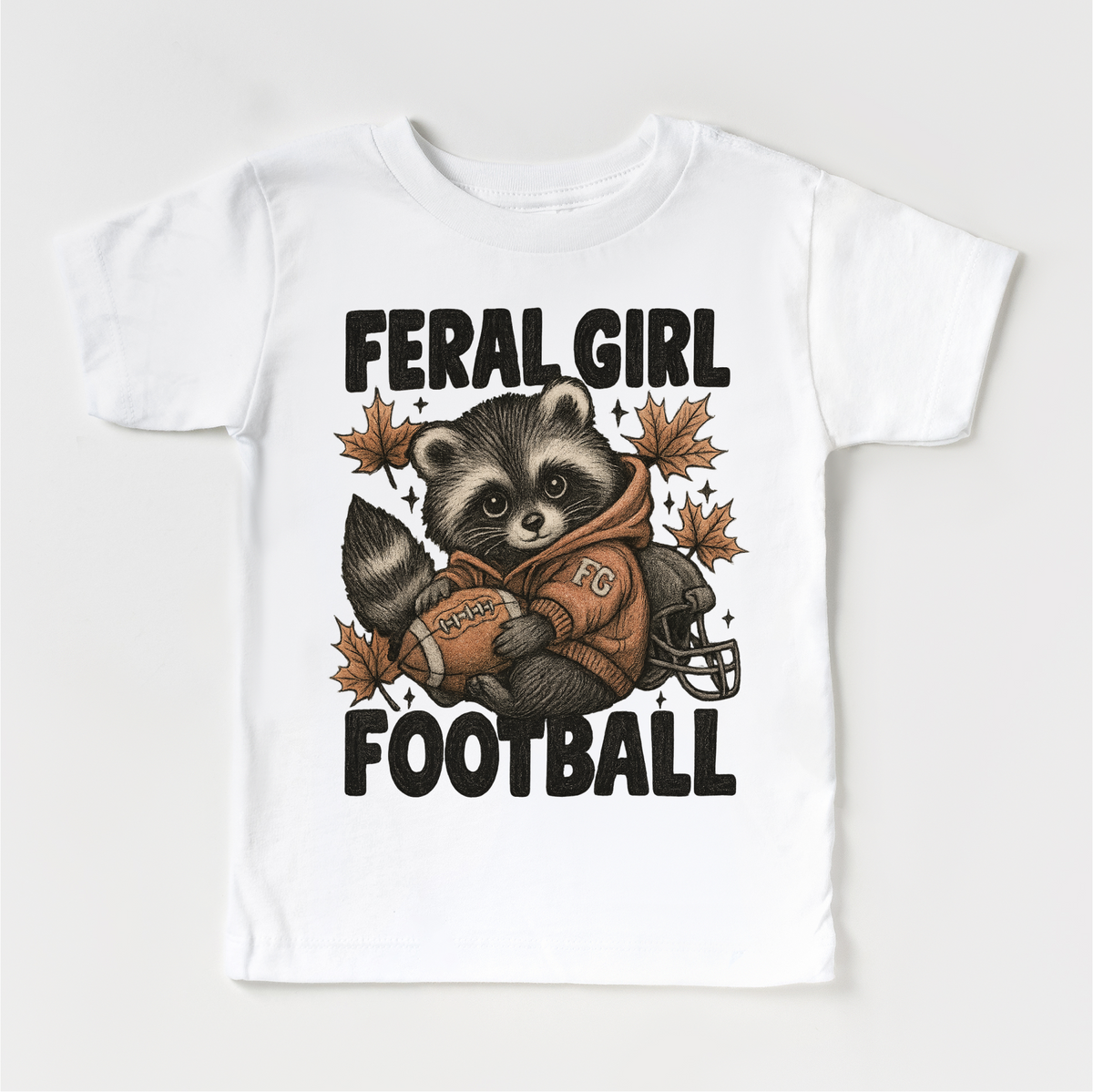 Feral Girl Football Raccoon design on a white garment.